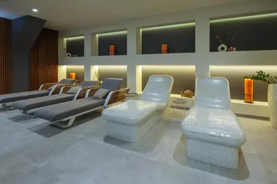 a waiting room with a row of chairs and tables at Bansko 1BR for 4 w Balcony View Spa Near Ski Lift in Bansko