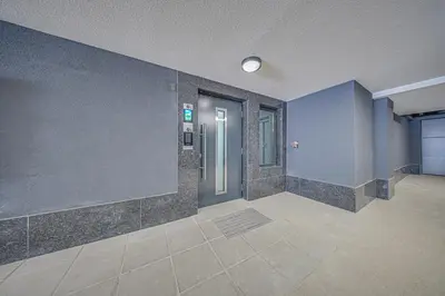 an empty hallway with a door in a building at NOAR - Free parking - Metro access in Sofia