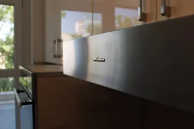 a kitchen counter with the name of a walazon sign on it at Bright & Cozy Apartment for 4 Guests in Plovdiv Centre in Plovdiv