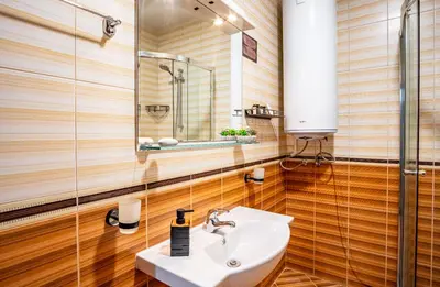 a bathroom with a sink and a mirror at Oxygen Time in Smolyan