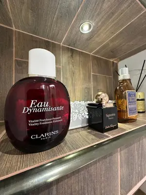a bottle of soap sitting on a shelf at Apartament Avangard in Pazardzhik