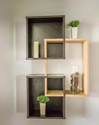 a wooden shelf with plants and a vase on it at Everwood Hotel & Restaurant in Govedartsi