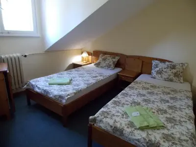 a hotel room with two beds and a window at Boeritza Hotel Complex in Vladaya