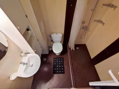 an overhead view of a bathroom with a toilet and sink at Deluxe Apartment 