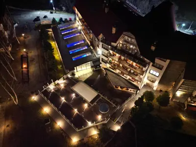 an overhead view of a building with lights at night at Grand studio in 4star SPA resort in Bansko in Bansko