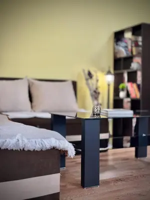 a living room with a couch and a coffee table at City Modern & Cozy Apartment for 4 Guests in Sofia, Lozenets in Sofia