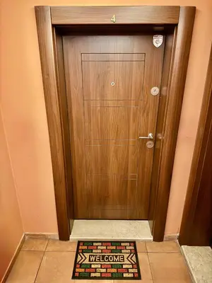 a wooden door with a welcome come sign on it at City Modern & Cozy Apartment for 4 Guests in Sofia, Lozenets in Sofia