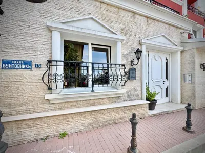 a building with a balcony on the side of it at City Modern & Cozy Apartment for 4 Guests in Sofia, Lozenets in Sofia