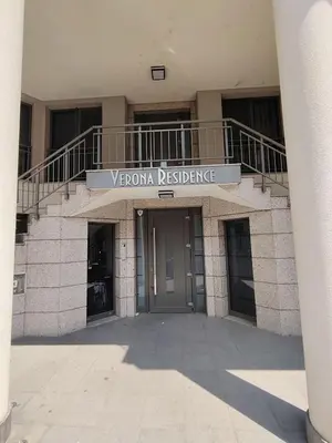 a building with a sign that reads verona prestige at Good Mood Room in Plovdiv