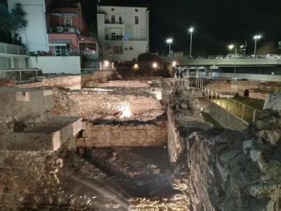 a stone amphitheater at night with lights at Good Mood Room in Plovdiv