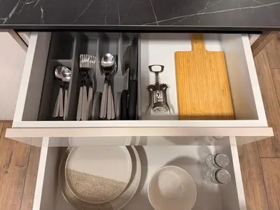 a drawer filled with utensils in a kitchen at Serenity Suites in Gotse Delchev