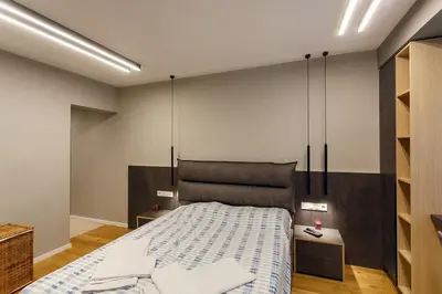 a bedroom with a bed in a room at Apartment in Sofia's core - NDK in Sofia