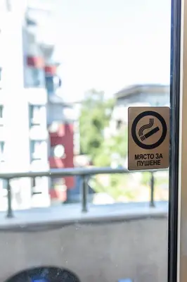 a sign on a window of a bus at Megy's 3rd Top Central Room in Sofia