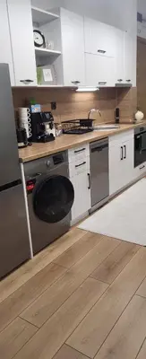 a kitchen with a sink and a dishwasher at Green apartment Velingrad in Velingrad