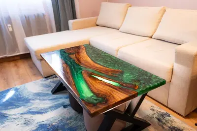 a living room with a couch and a coffee table at 1 minute to main Street & NDK & Free Parking in Sofia