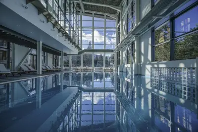 an empty building with a pool of water in it at White & Wood Suite C302, at Euphoria SPA Borovets in Borovets