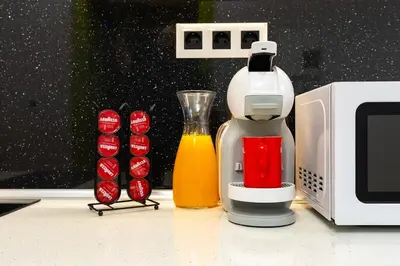 a kitchen counter with a coffee maker and a blender at Apt Kosmos in the best Central Area in Plovdiv in Plovdiv