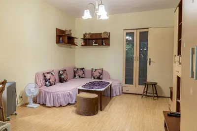 a living room with a couch with dogs on it at The Lindens 1 Bedroom Cozy Apartment plus Free Parking!!! in Sofia