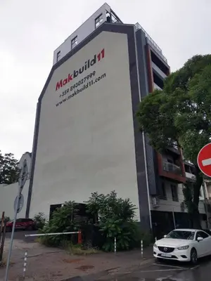 a building with a car parked in front of it at Dream Home A3 in Sofia