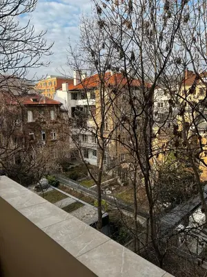 a view of a city with buildings and trees at Spacious artsy apartment in Sofia