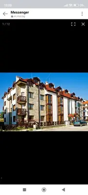 a picture of a large building with avertisement at Comfy Studio in Bansko