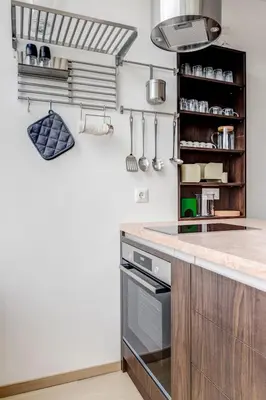a kitchen with white walls and a counter top at Modern 1BDMApartment Near Shopping Mall & Metro in Sofia
