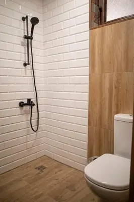 a bathroom with a shower with a toilet in it at Yaninata Art House in Teteven in Teteven