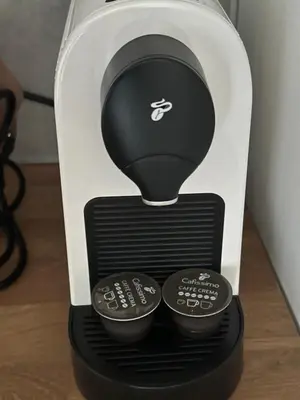 a coffee maker with two cups in a box at Rose studio - Bulgaria mall, Brand New, Ground floor, Family-friendly, Baby cot&chair, Mountain view, Self check-in, Free Public parking and Paid underground in the mall in Sofia