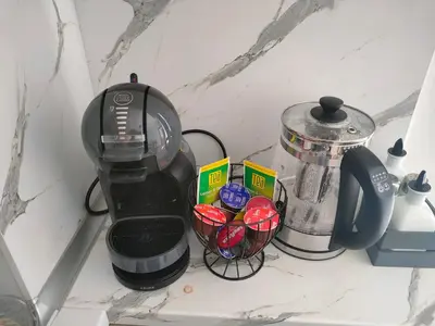a counter with a coffee maker and a blender at Apartment B35, complex Sokolitsite in Pamporovo