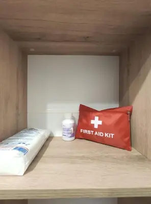 a first aid kit sitting on a shelf in a room at Apartment B35, complex Sokolitsite in Pamporovo