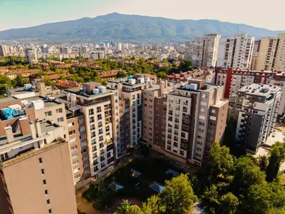 an aerial view of a city with tall buildings at Mountain View Sky Apartment Ori 4 in Sofia