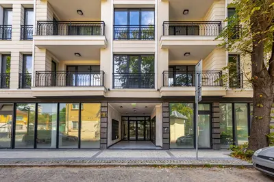 an exterior view of a building with large windows at Downtown Modern Studio with Balcony by Flat Mаnager in Plovdiv