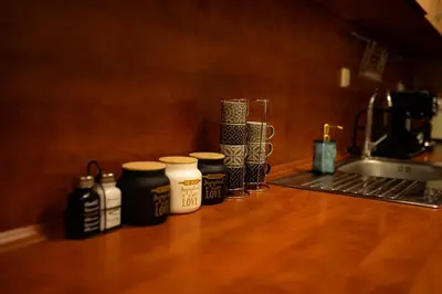 a counter top with several bottles of paint on it at 2 DeLuxe Apartments, Top Center Free Parking, 4 BDR in Sofia