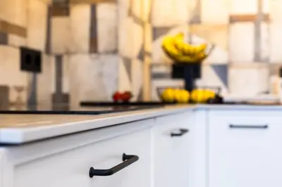 a kitchen with a white counter top with a drawer at Art Retreat Zaimov in Sofia