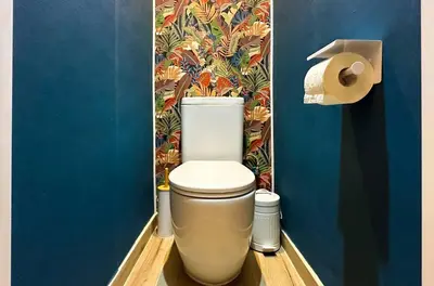 a bathroom with a toilet and a roll of toilet paper at 2BR, 4 Baths, Terrace Steps from Sofia Landmarks in Sofia