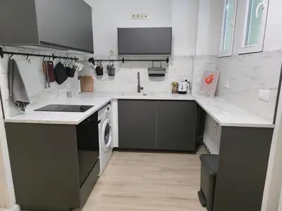 a kitchen with a sink and a stove at Modern 100m Apt In Sofia Center Vitosha Blvd in Sofia