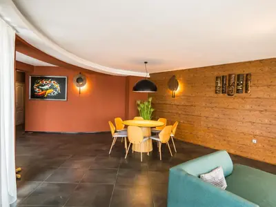 a dining room with a table and chairs at Venti club B15 in Sofia