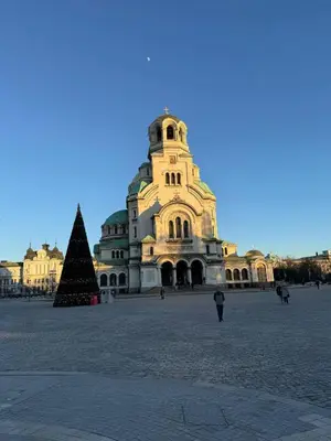 a building with a christmas tree in front of it at Апартамент 36 in Sofia