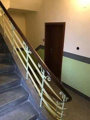 a set of stairs leading up to a door at Апартамент 36 in Sofia