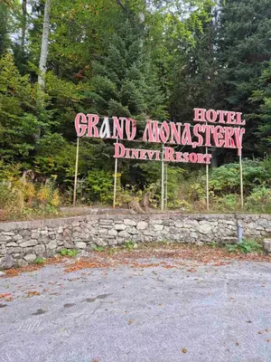 a sign for a hotelasyasyasyasyasyasy at 1А1 Apartament in Pamporovo