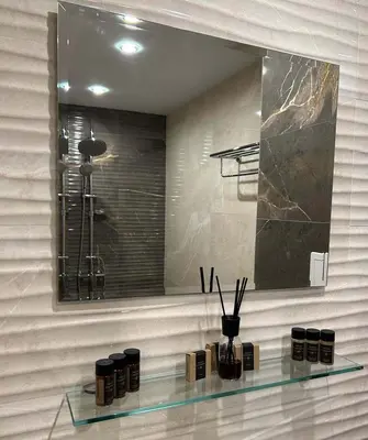 a glass shelf in a bathroom with a mirror at Zlati`s house 1 in Sofia