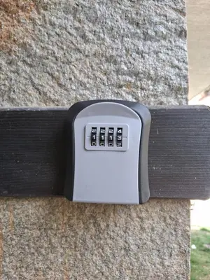 a close up of a remote control on a wall at ТРИ ПЛАНИНИ ап113 in Razlog