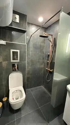 a bathroom with a toilet and a shower at Apartment Maritsa View 2 in Plovdiv