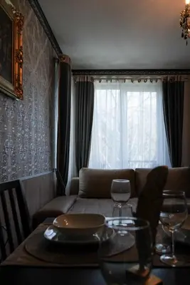 a living room with a couch and a table at Pirin Elegance Apartment by Gondola Lift in Bansko
