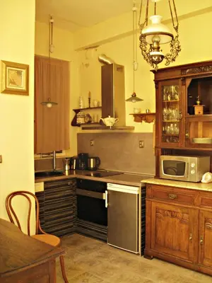 a kitchen with a sink and a stove top oven at Maritsa River Apartment in Plovdiv