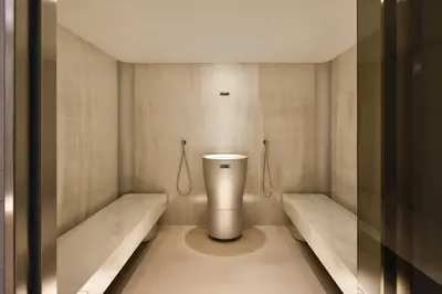 a bathroom with a toilet and two sinks at Hotel HAYASHI - Free Parking and Fitness in Sofia