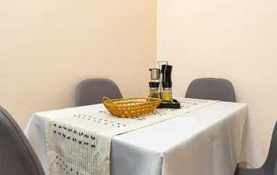 a table with a wicker basket on top of it at City Retreat with Local Charm in Plovdiv