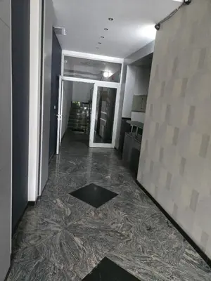 a hallway with a room with a tile floor at Cozy Apartment in Lozenetz by 7th Sence in Sofia