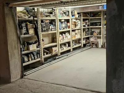 a room filled with shelves filled with products at Bright and Cozy Studio with Garage near the Center in Sofia