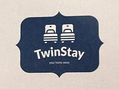 a sign that readstwineway with three pancakes at TwinStay #6 - Deluxe Super King Suite in Sofia